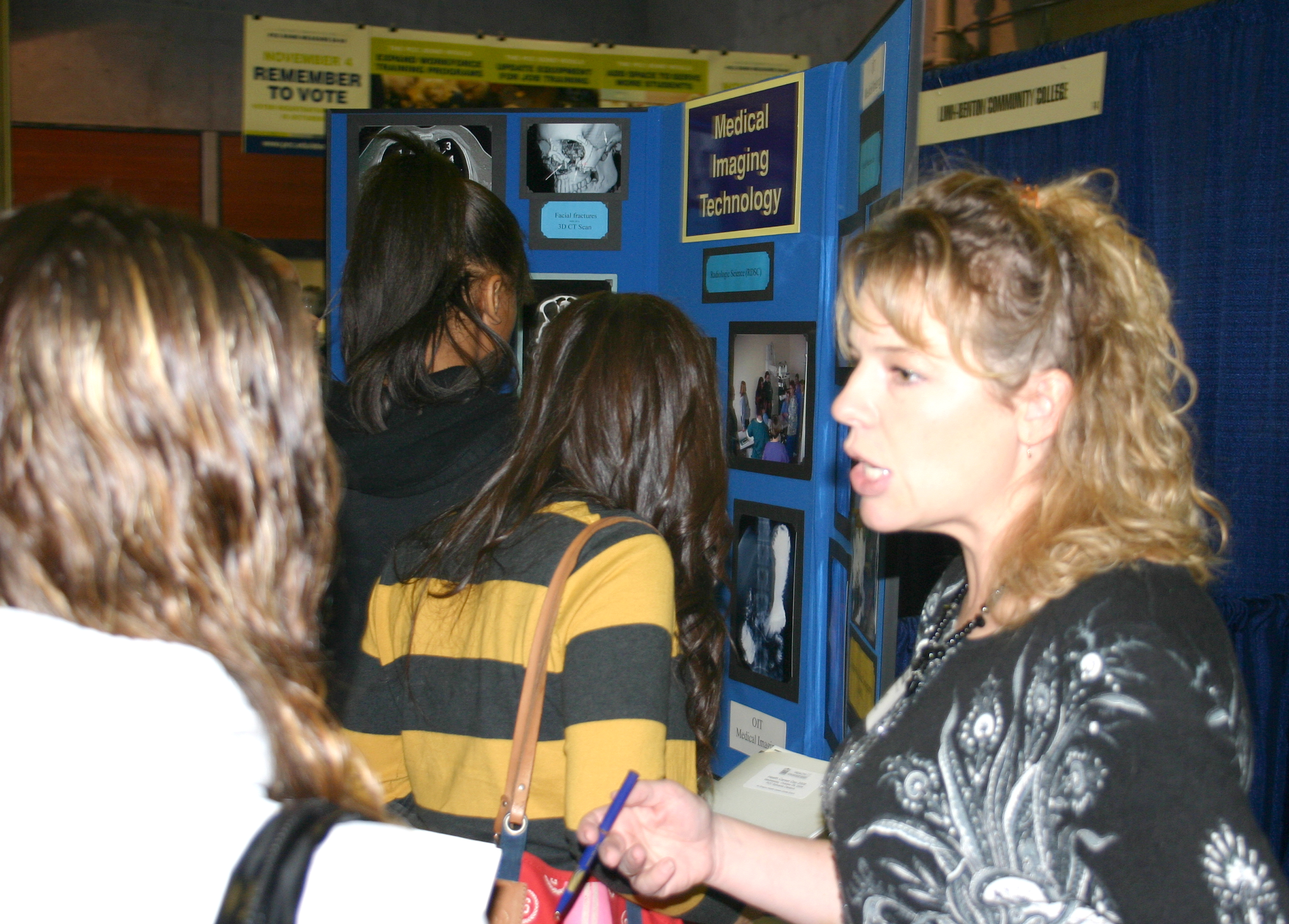 Robyn Cole of OIT helps students Wednesday at Sylvania