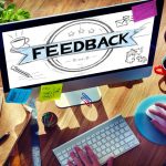 A computer screen with the word feedback on it