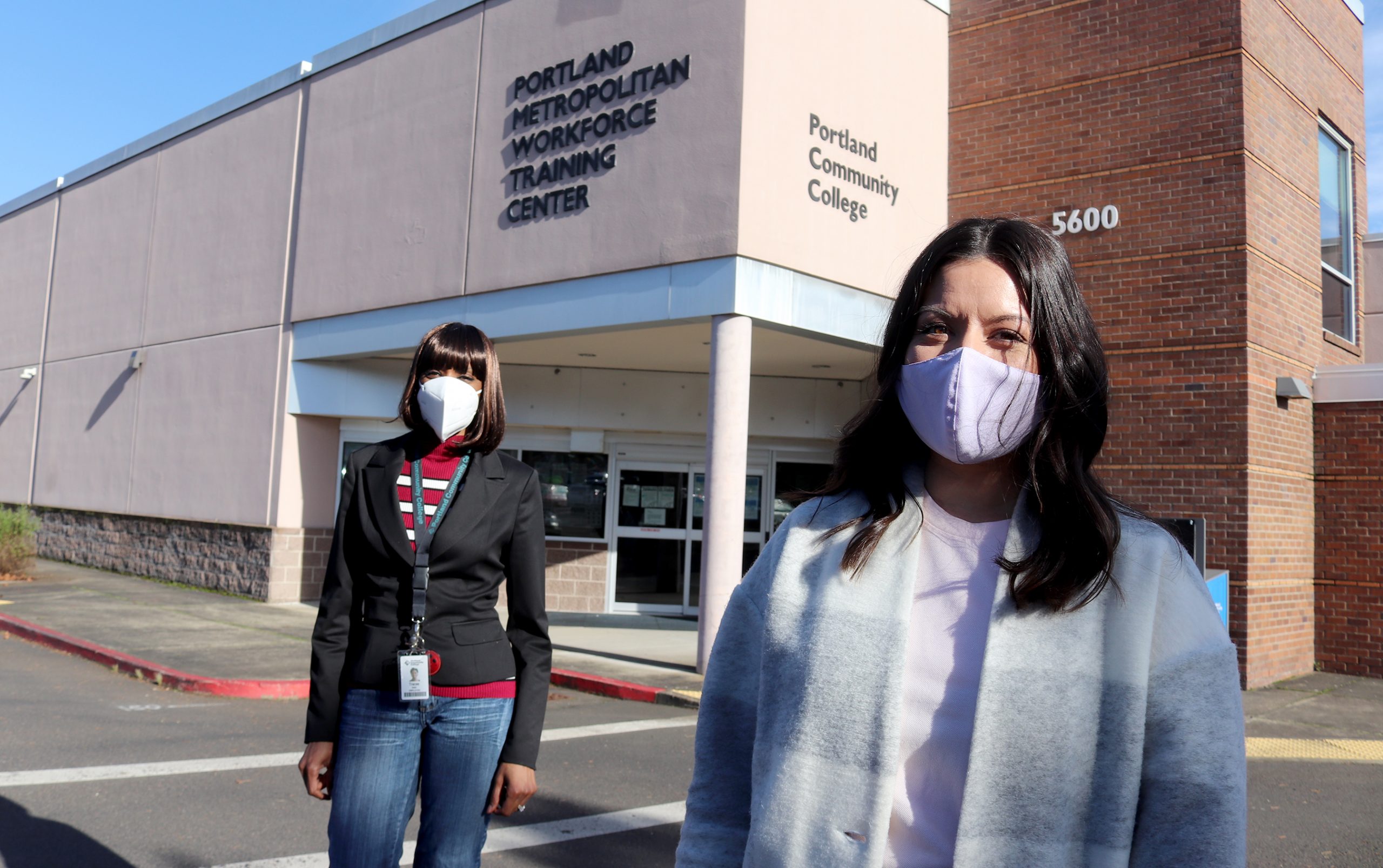 Student Nahlee Suvanvej standing at Opportunity Center at 42nd Avenue with Mentor Tracee Wells