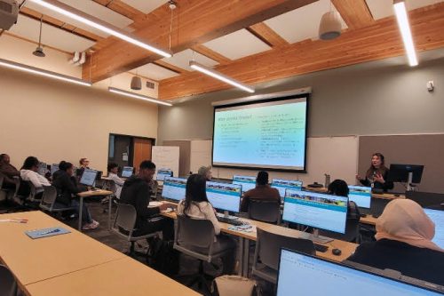 Students attending class in a classroom