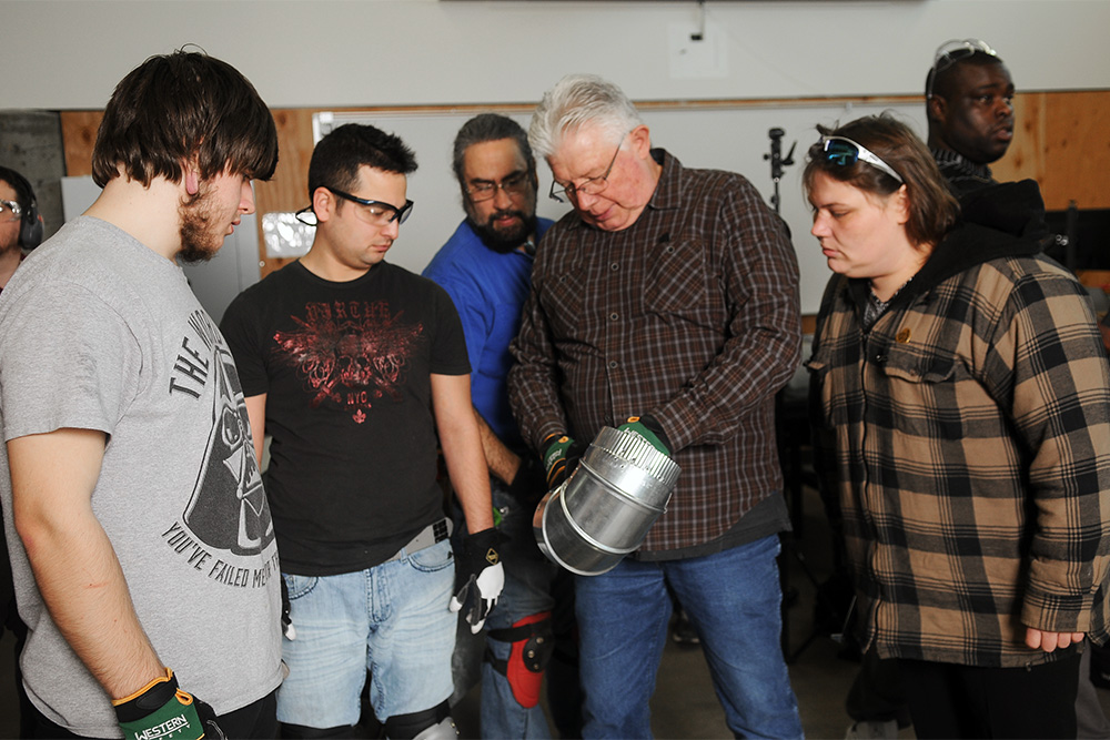 HVAC instructor demonstrating for students