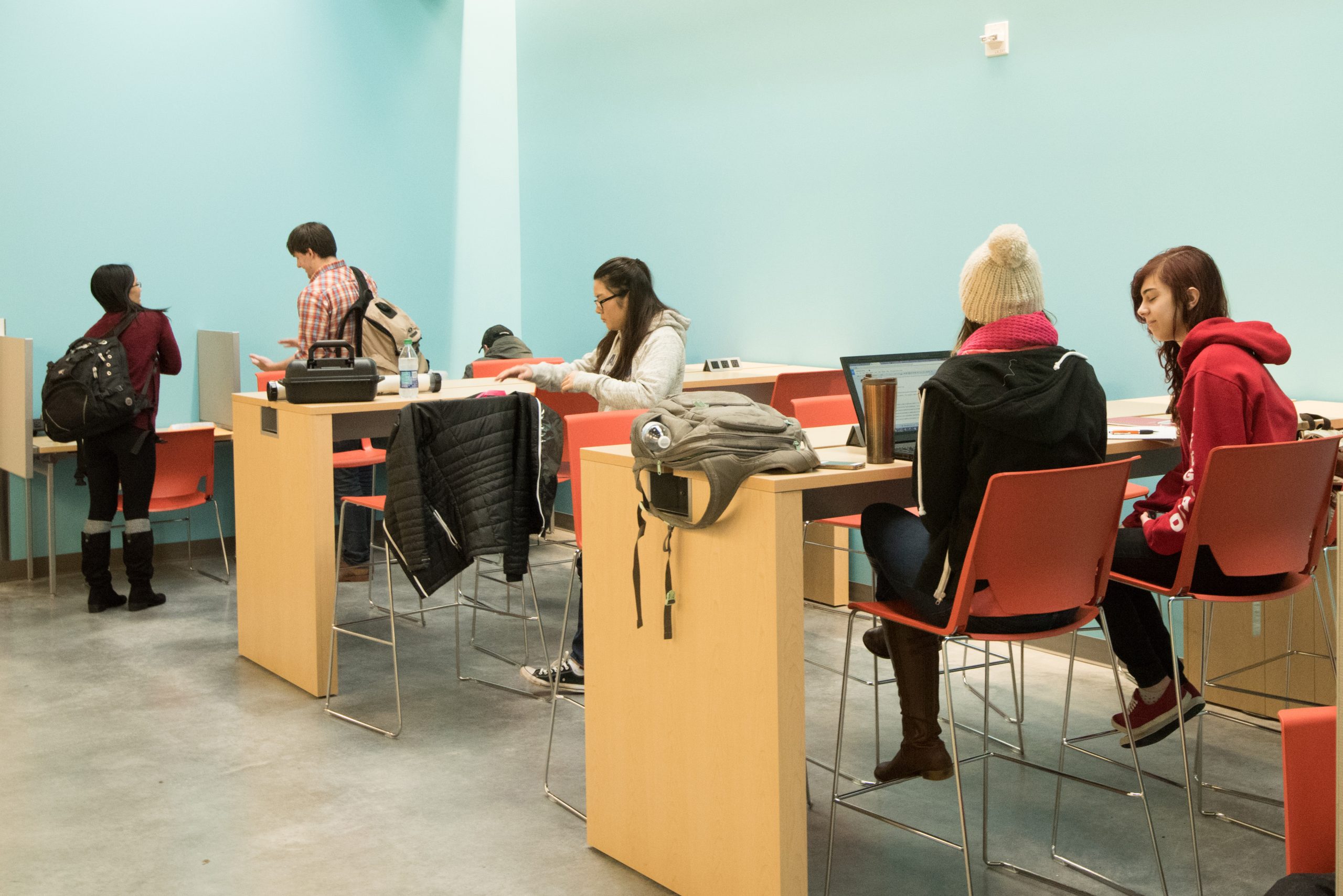 students getting help in the rock creek library