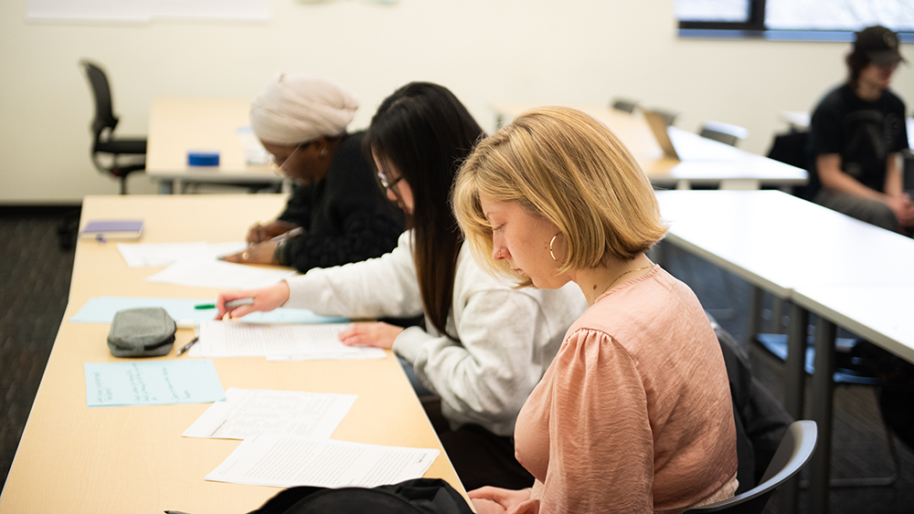 Accounting students working in class