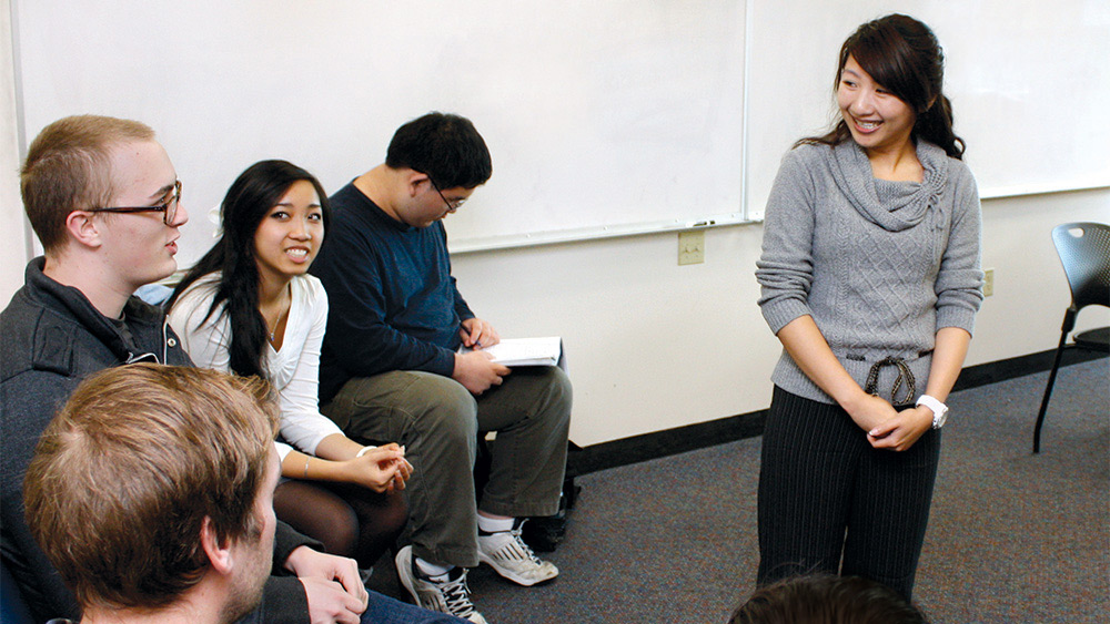 Students sitting in a circle and talking