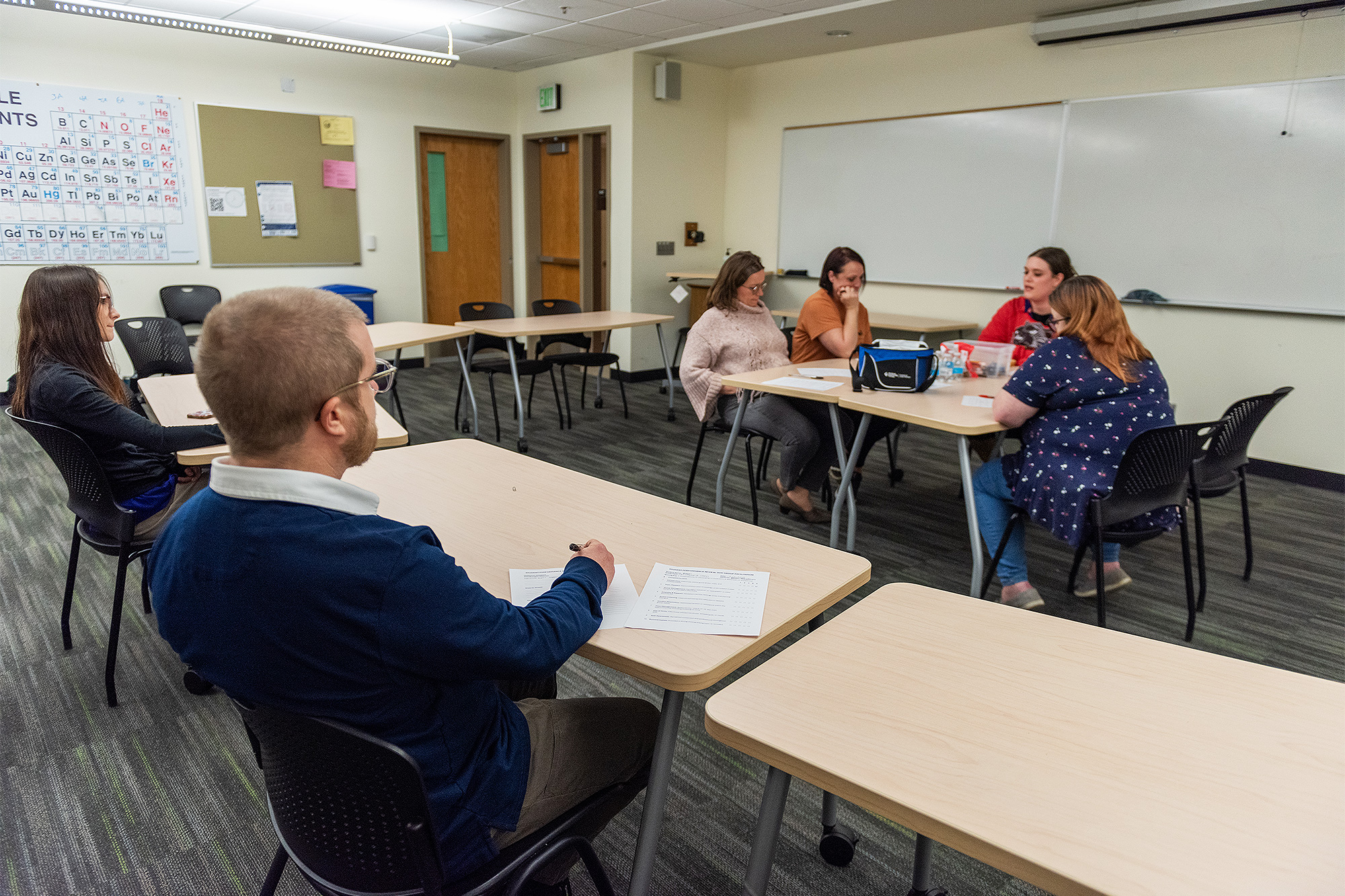 Addiction Counseling student watching and scoring the mock session