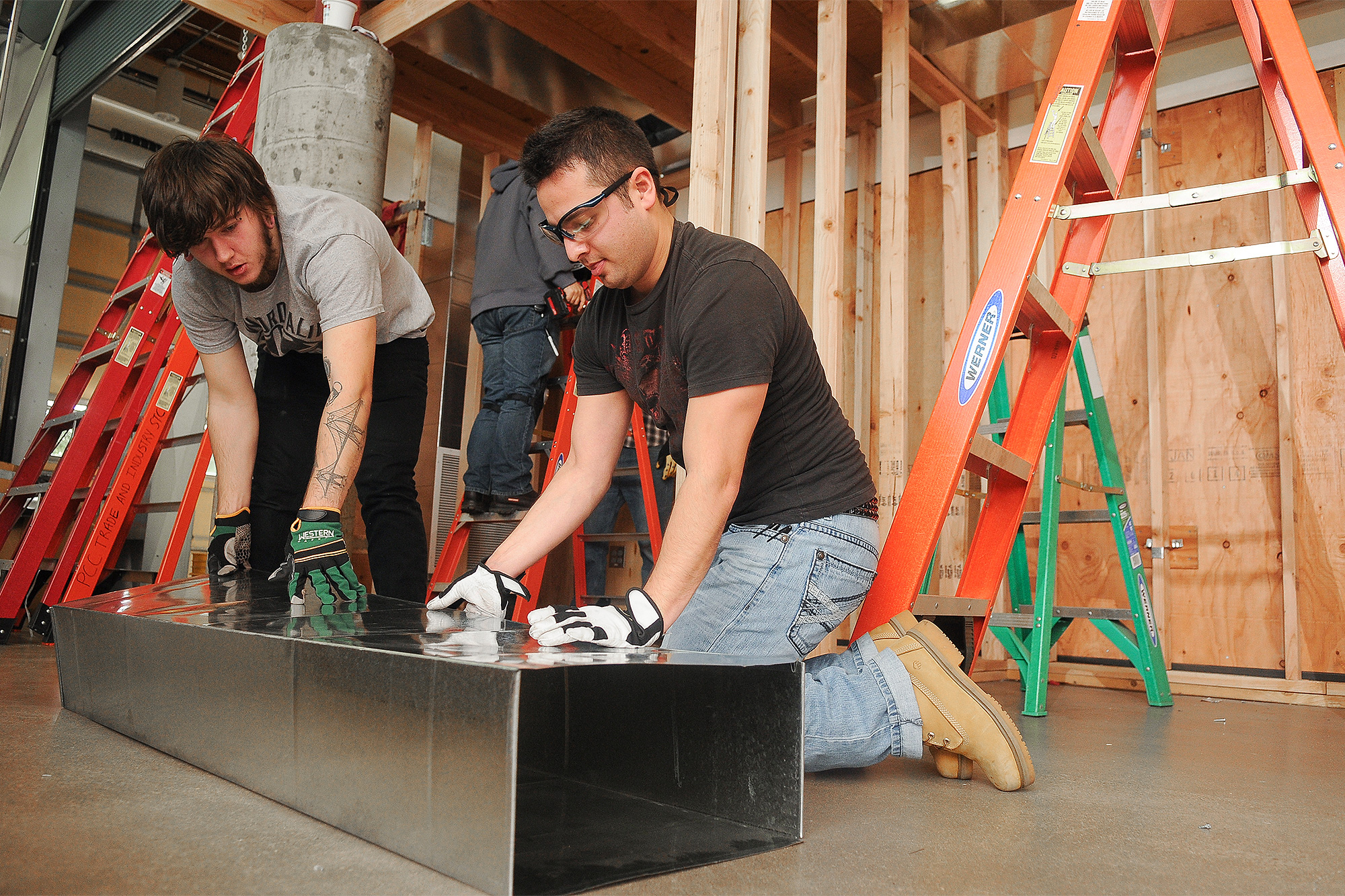 Students working with materials in the classroom