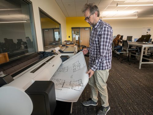 Large plans coming out of printer