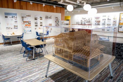 Architectural Design and Drafting models and printed plans in a study area