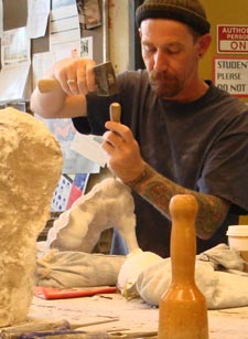 Student working in the sculpture studio