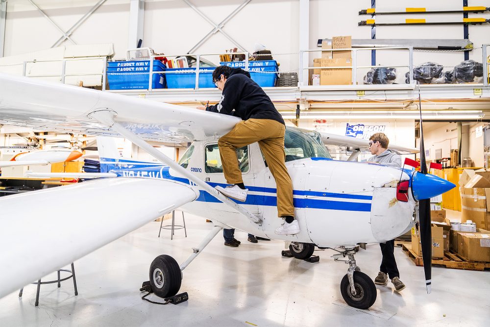Student working on a Cessna wing