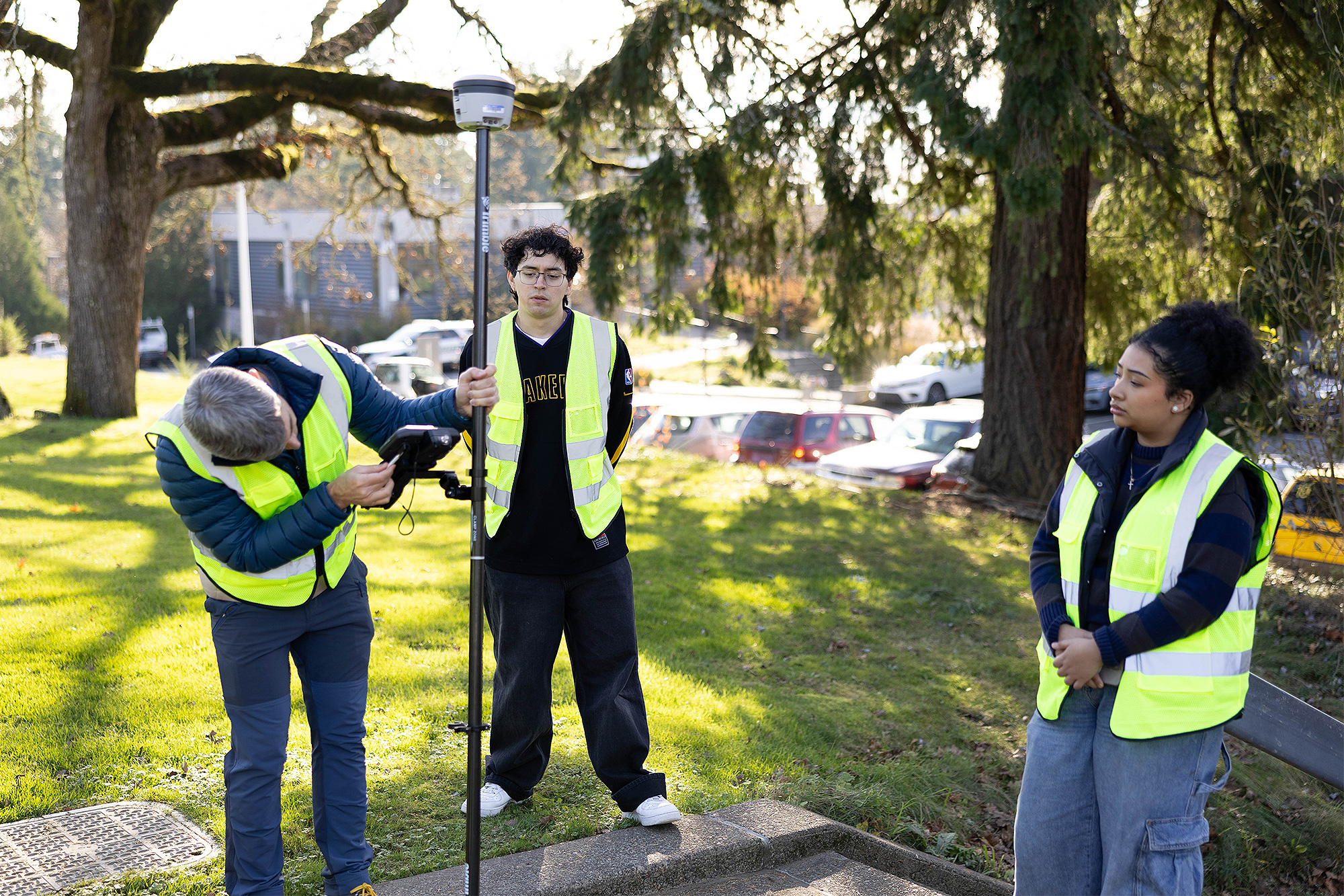 Civil and Construction Engineering Tech students working with survey equipment