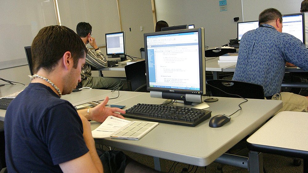Students in a computer lab classroom