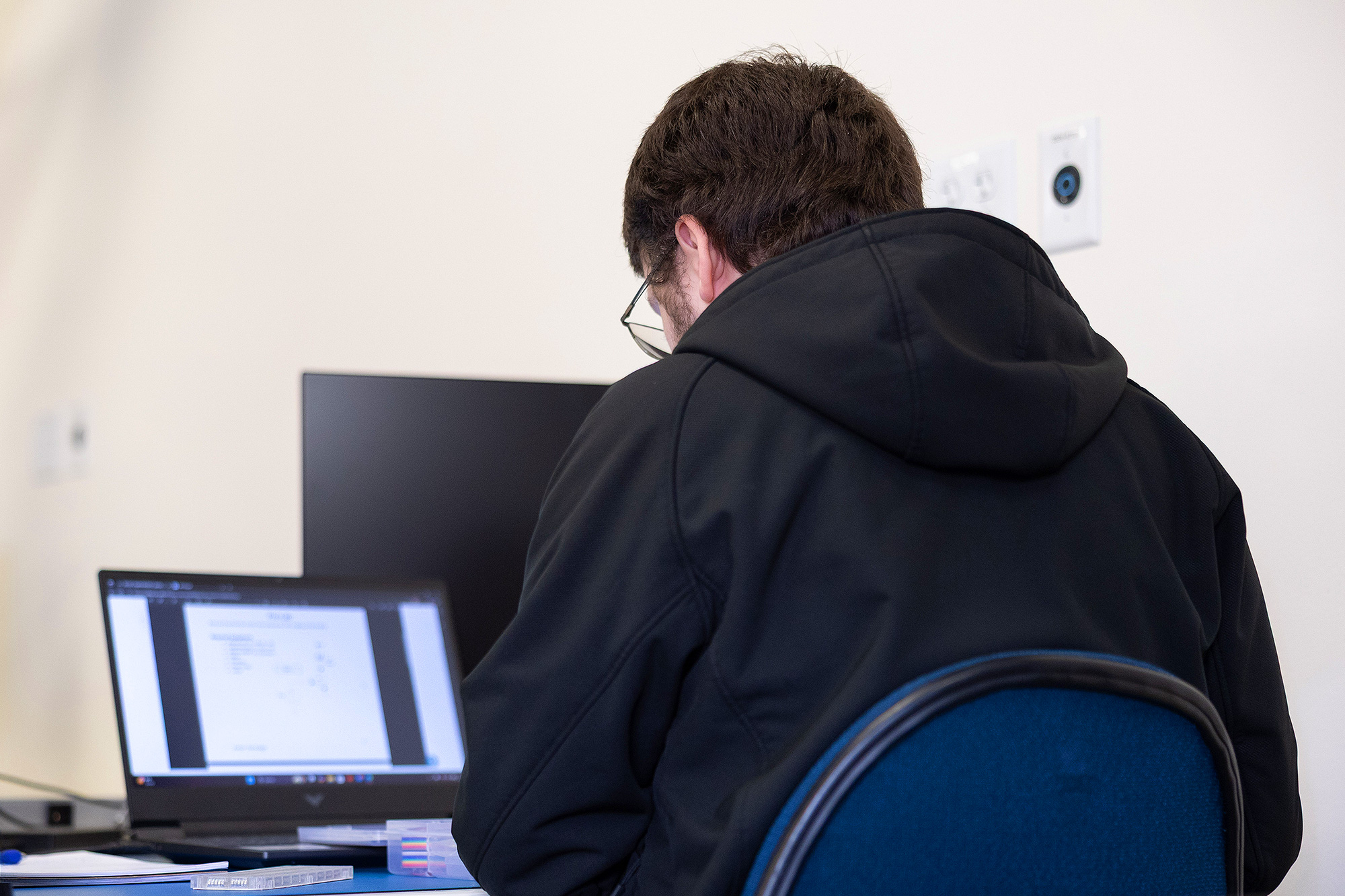 Cybersecurity student in class