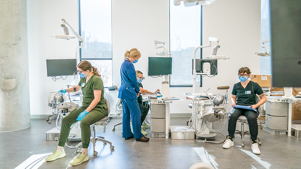 Dental Assisting students working in the clinic classroom