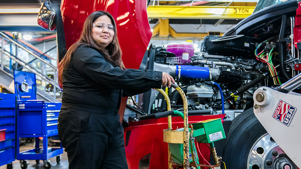 Student working on a diesel truck