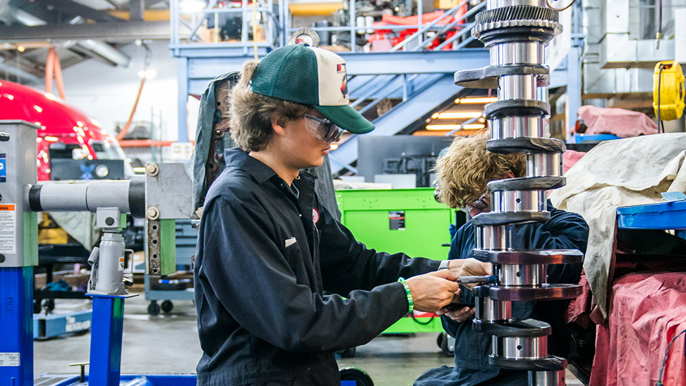 Diesel service student working in shop