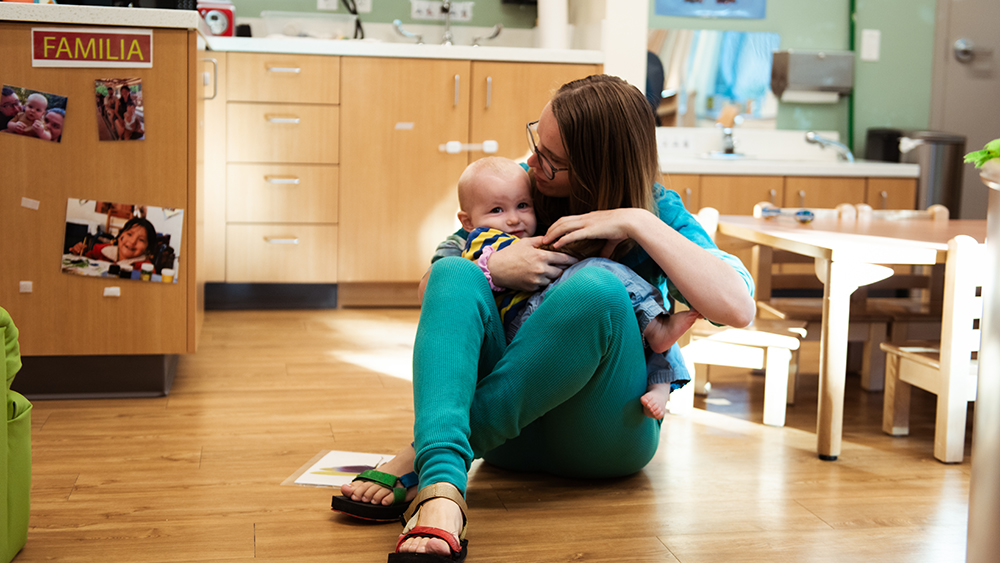 Teacher hugging a student