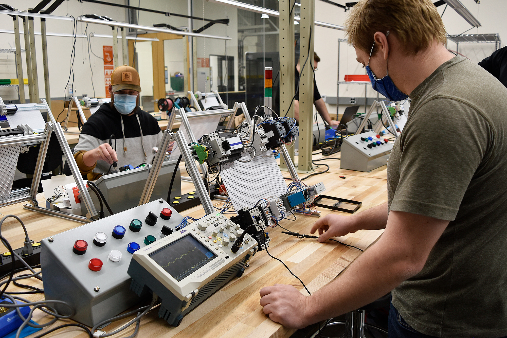 Electronic Engineering Technology students in a mechatronics class