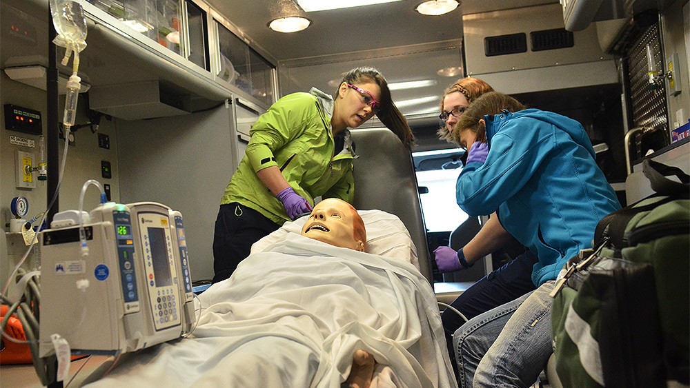 EMT simulation training inside an ambulance