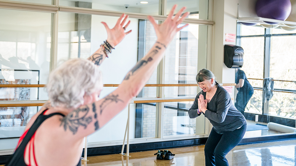 Students stretching in class
