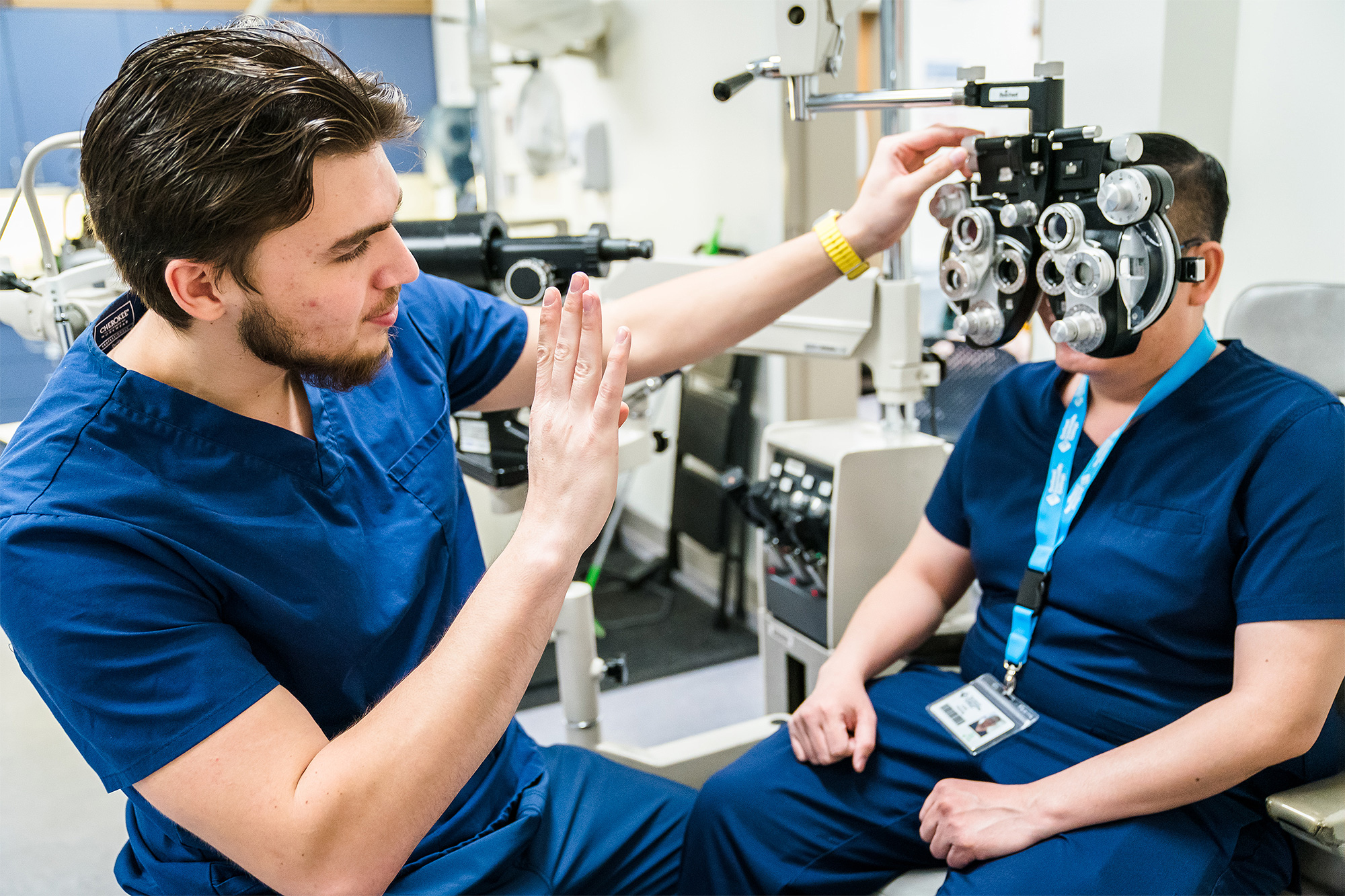 Eye Technician students working with ophthalmic testing equipment