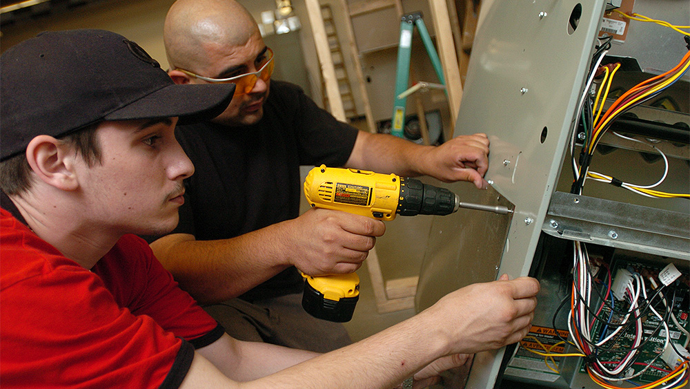 Students working on hvac materials