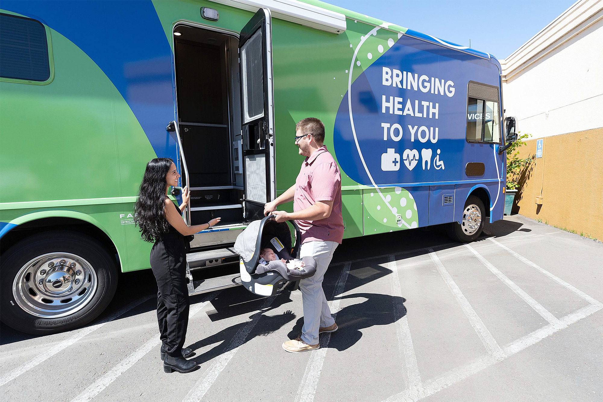 Family and Human Services student volunteering at a mobile health clinic