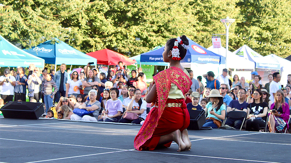 Young girl performing an Asian dance