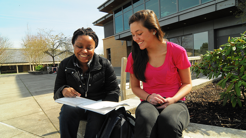 Women studying outside together