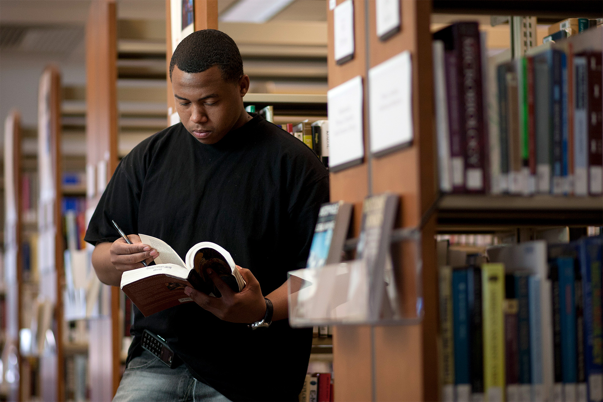 History student reading in the library