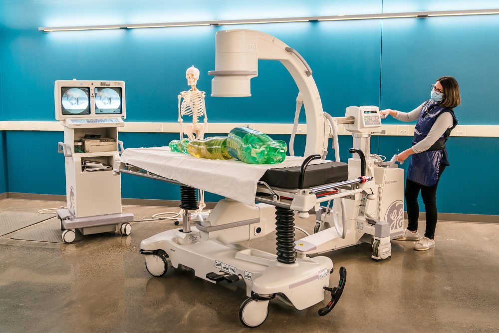 Medical Imaging student X-raying a mock torso