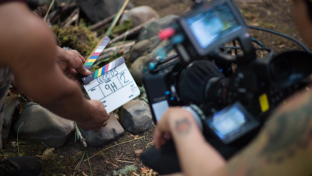 Camera focusing on clapperboard