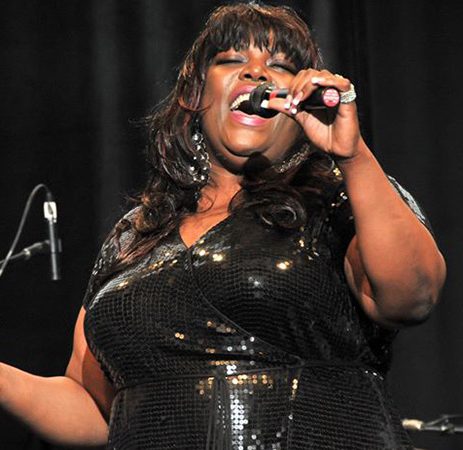 Julianne Johnson-Weiss singing during a performance