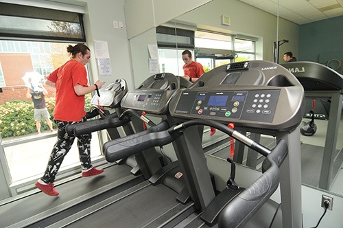 Student using a treadmill at Southeast