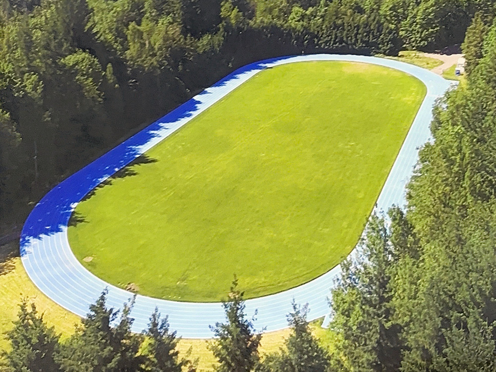 Aerial photo of the blue outdoor running track