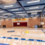 Sylvania gym view of stage with curtains
