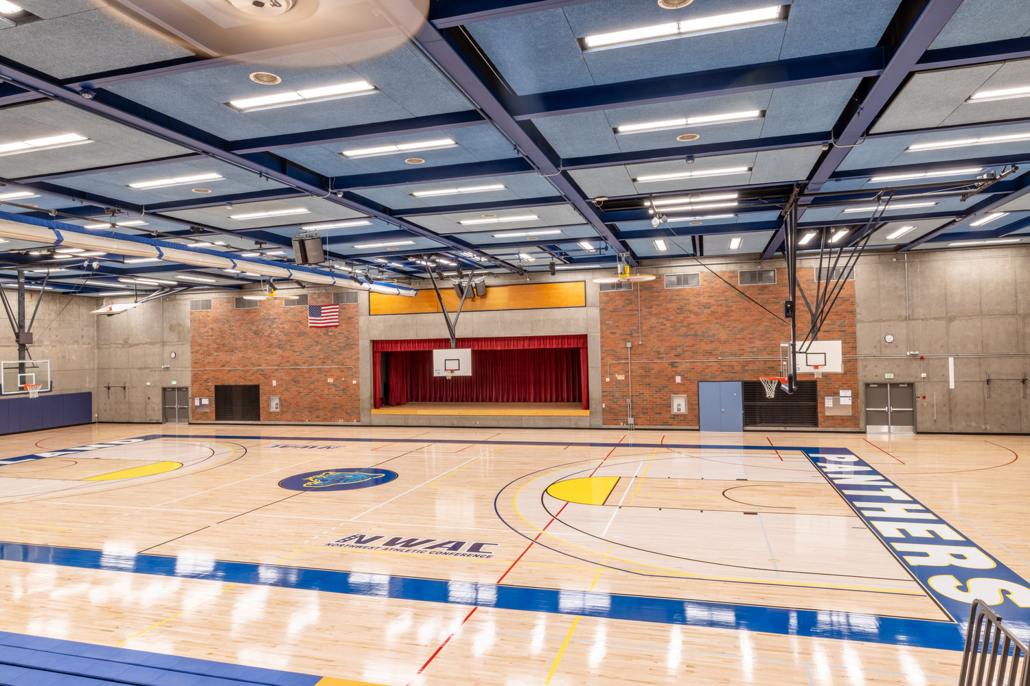 Sylvania gym view of stage with curtains