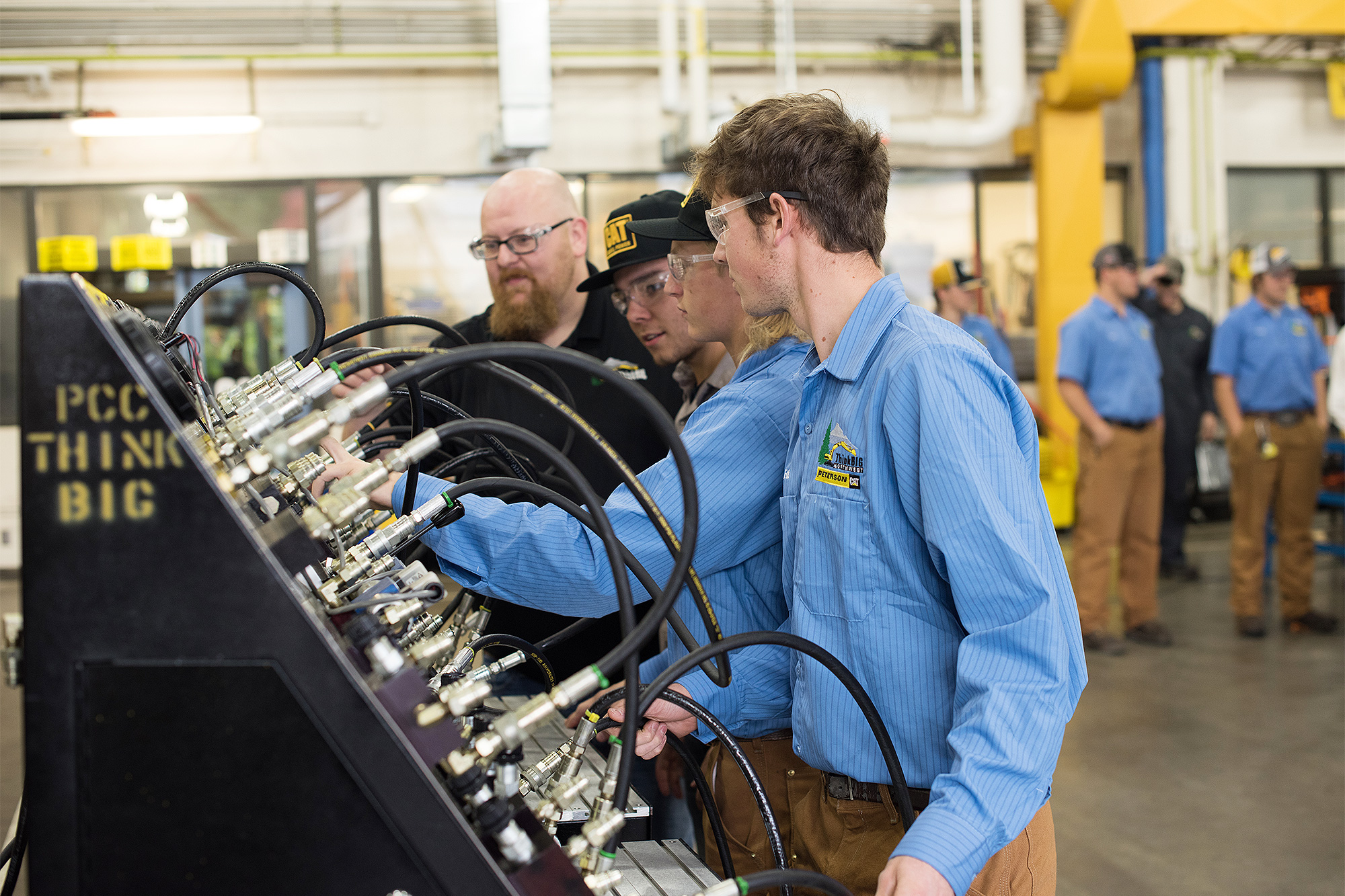 ThinkBIG students working with power generation equipment