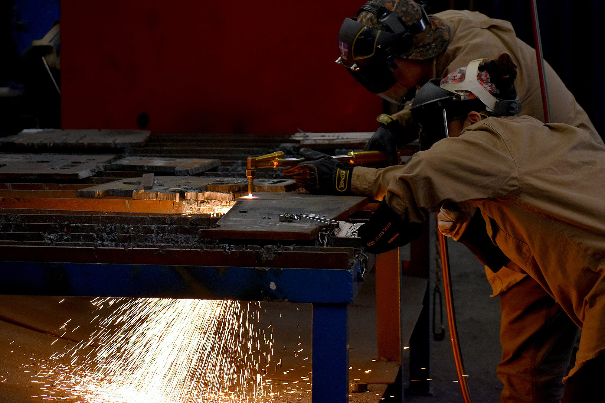 Maritime welding students working together in the shop