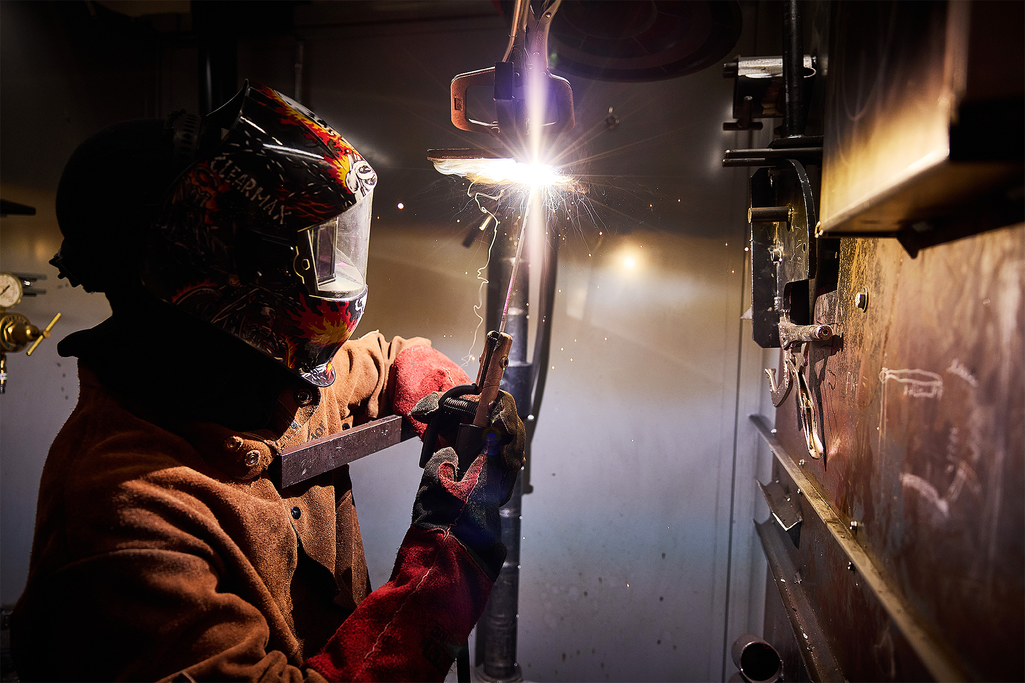 Student practicing shielded metal arc welding
