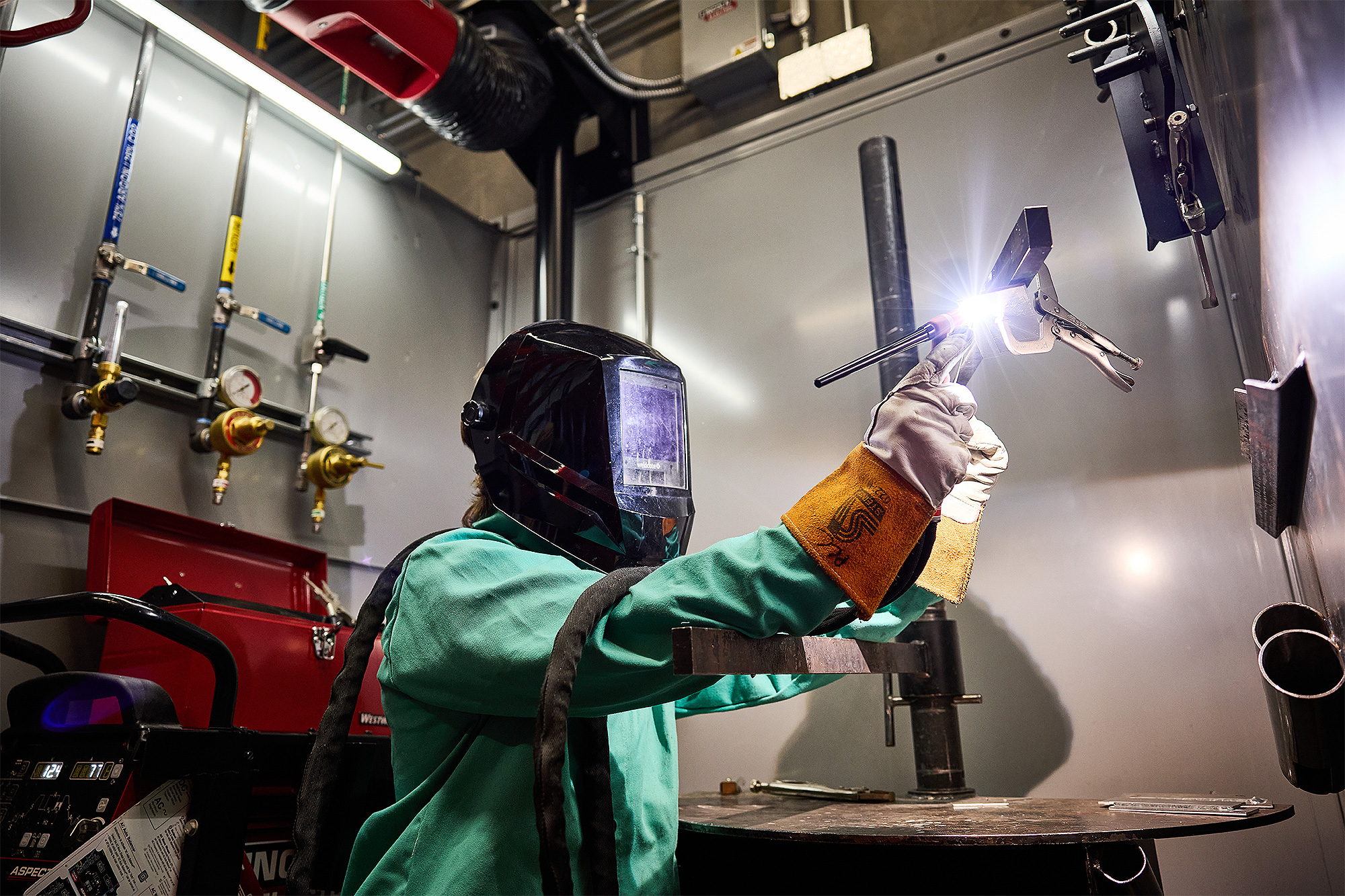 Student practicing wire welding