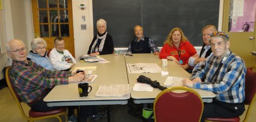 Senior Studies Institute particpants around a table