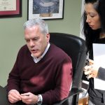 ACEs Pavement Services man and woman discussing business