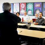 Instructor, back turned, leading CGBP Class