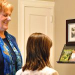 Woman teaches breathing exercises to student at business Breath is the Answer