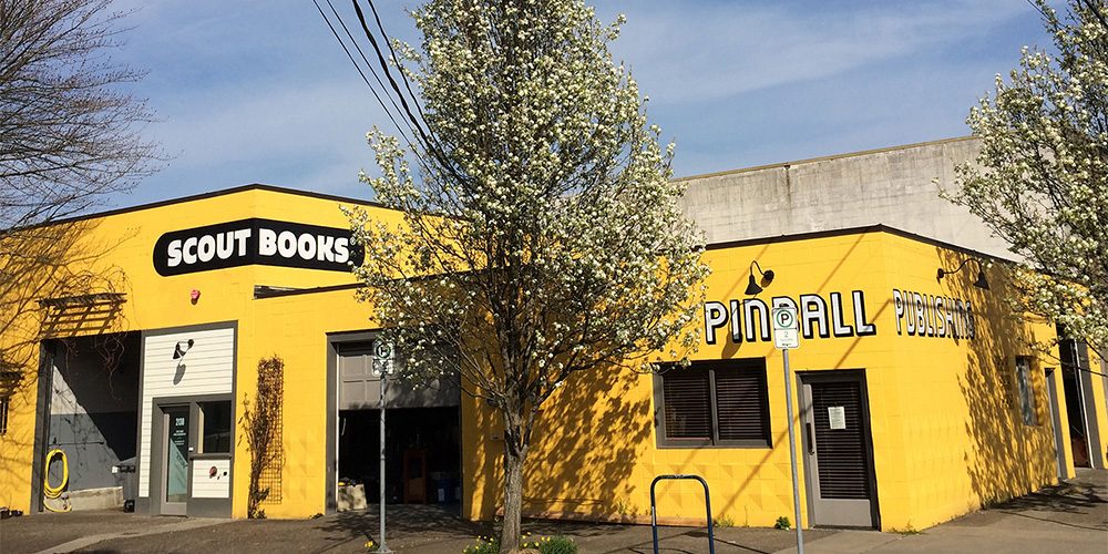 Exterior of Scout Books’ yellow building in Portland, OR