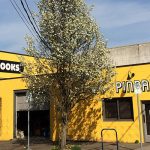 Exterior of Scout Books’ yellow building in Portland, OR