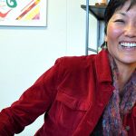 River Wave Foods owner Rebecca Kawanami smiling with her tapenade product line