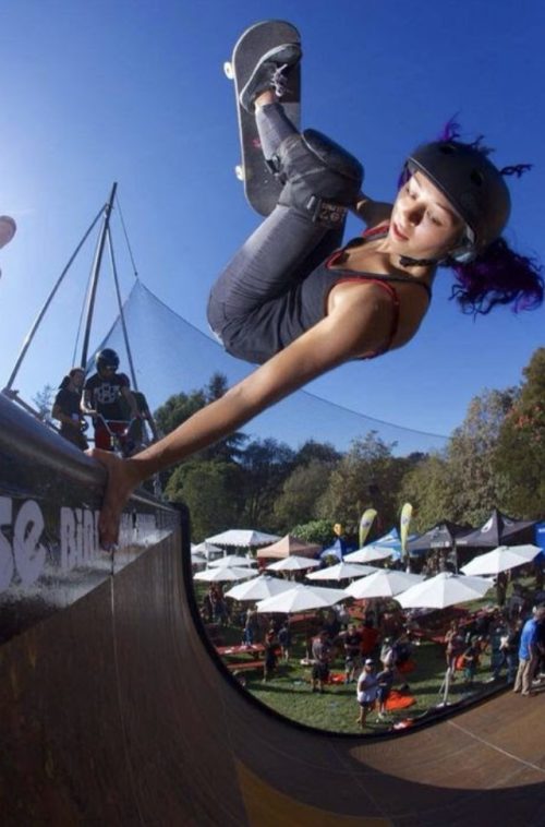 Woman doing a Frontside Handplant 