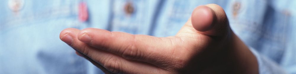 Up-close photo of an open, welcoming hand